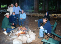 Family reconnecting around the fire.